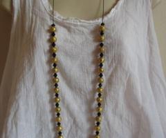 Collier sautoir noir et doré