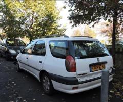 Peugeot 306 break accidenté roulante et réparable