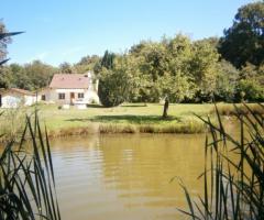 La maison du garde chasse et son étang